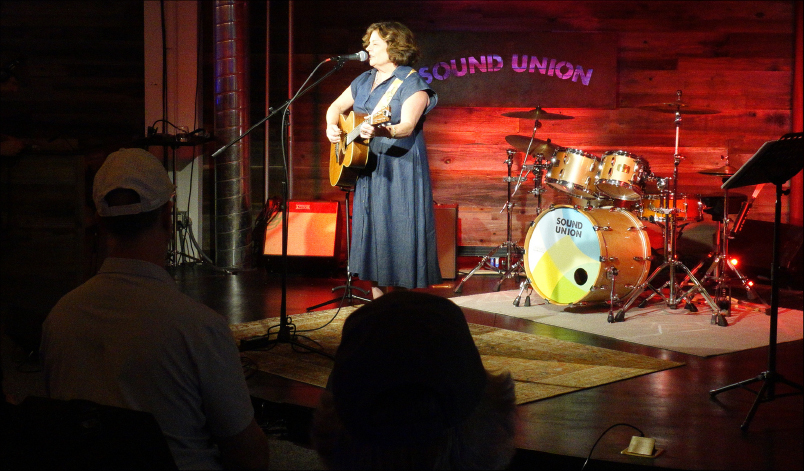 Sara performing on stage